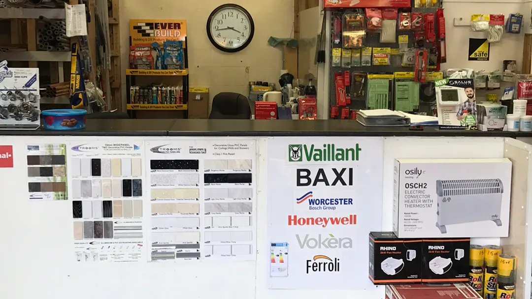 Boiler brand logos displayed at the BBS Ltd trade counter — Vaillant, Baxi, Worcester Bosch, Honeywell, Vokera, Ferroli